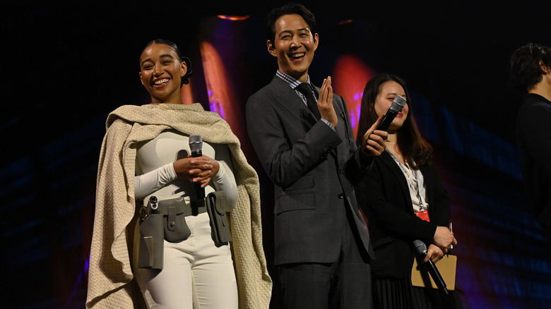 The Acolyte's Dafne Keen, Amandla Stenberg, and Lee Jung-Jae smiling