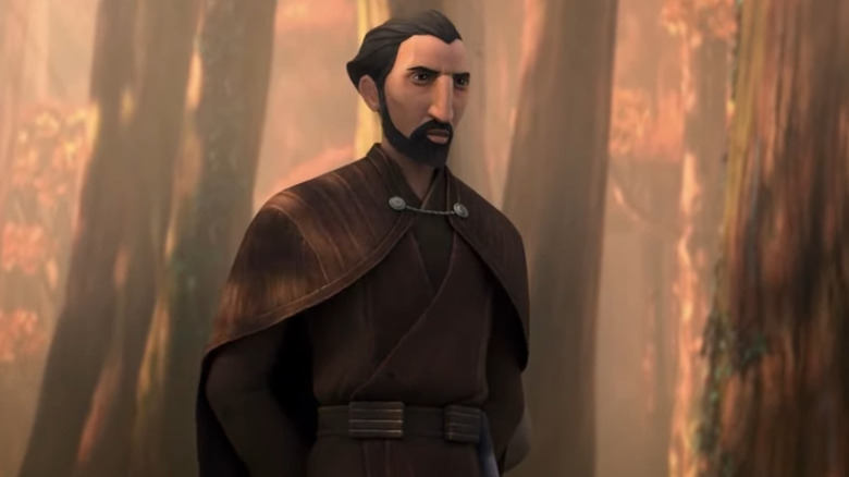 Count Dooku stands in the woods