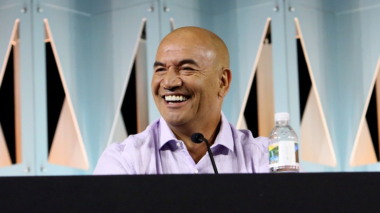 Temuera Morrison laughing during a panel at Star Wars Celebration