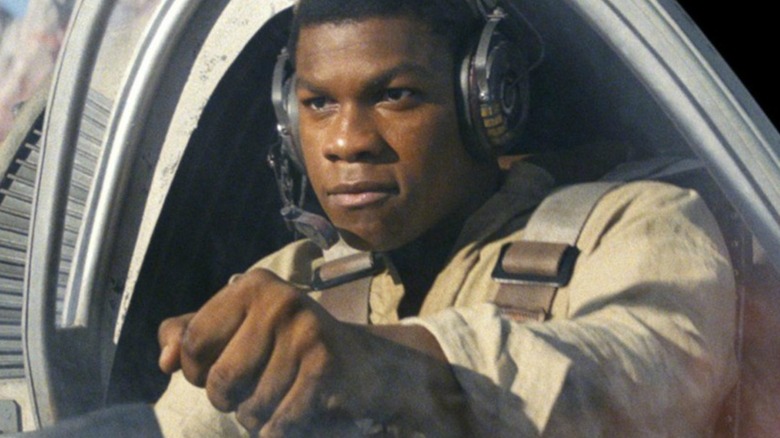 Finn piloting a ship