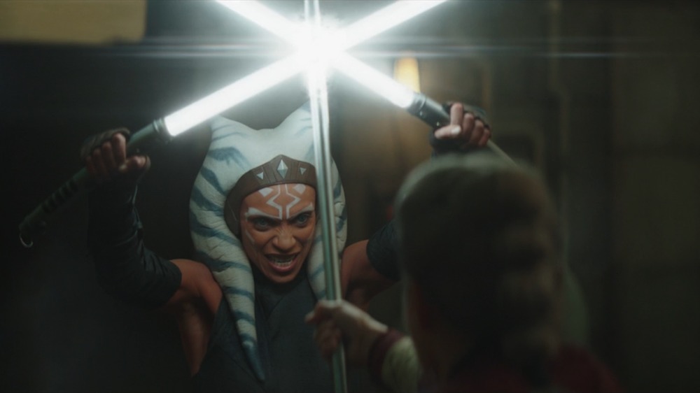 Rosario Dawson as Ahsoka Tano fights against beskar spear on The Mandalorian