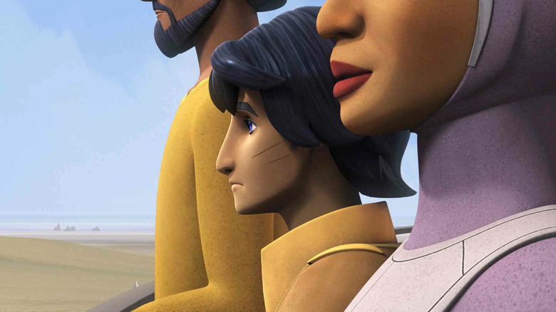 Ezra Bridger standing with parents