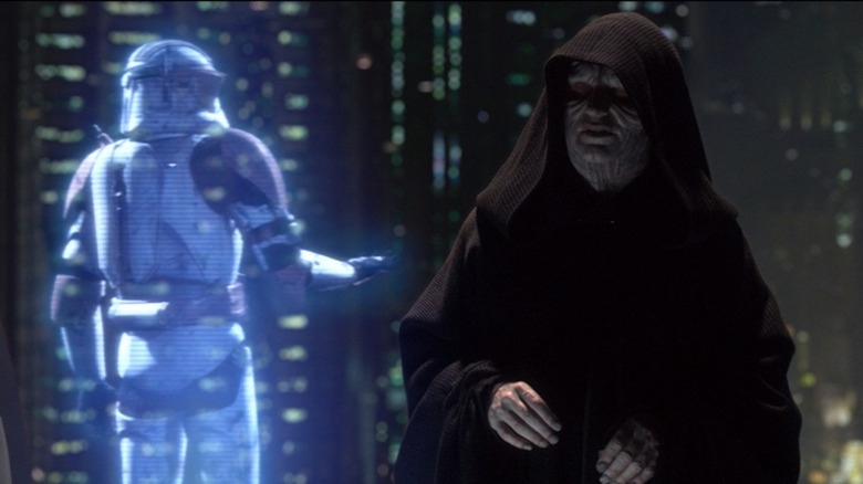 Darth Sidious talking to hologram of clone trooper