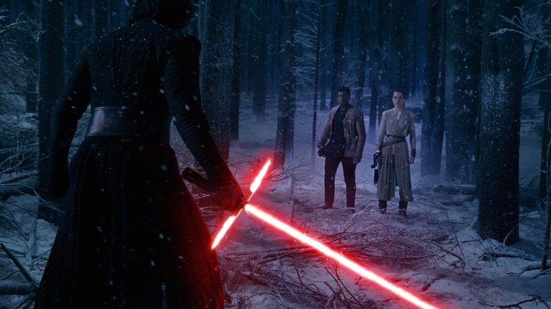 Kylo facing Rey and Finn