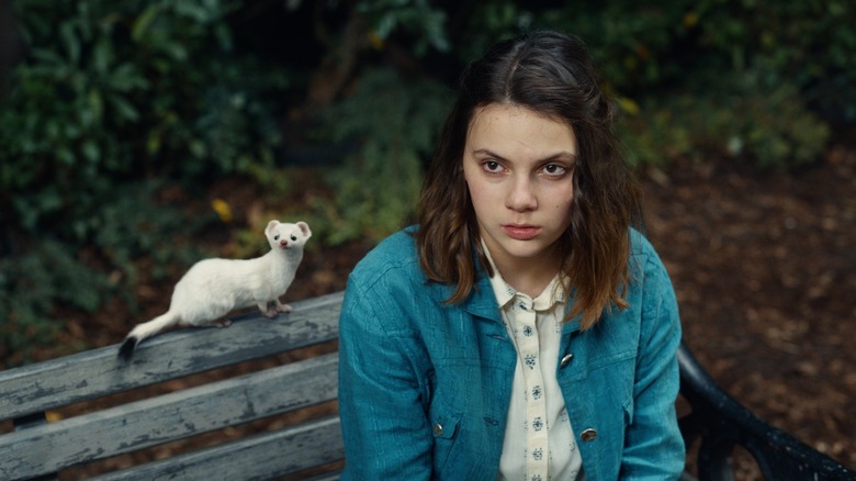 Lyra sitting on a bench