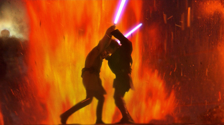 Anakin grappling with Obi-Wan