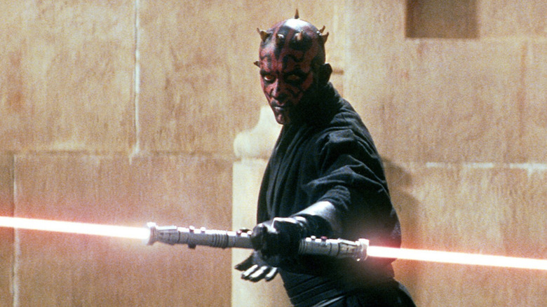 Darth Maul ignites his lightsaber