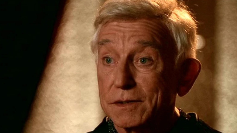 Henry Gibson raises his eyebrows