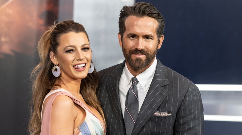 Blake Lively and Ryan Reynolds smile