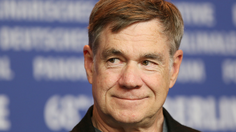 Gus Van Sant looking off to the side