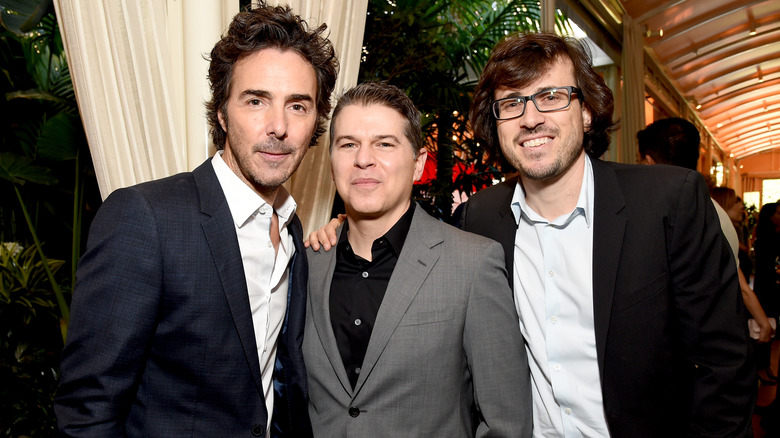 Shawn Levy, Dan Levine, and Dan Cohen smiling