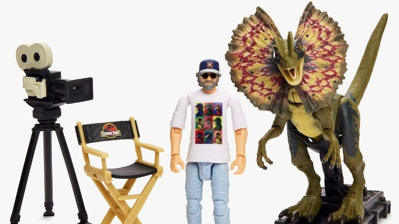 Spielberg figure stands by accessories