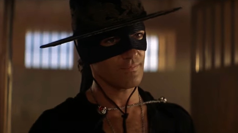 Zorro stands in a doorway