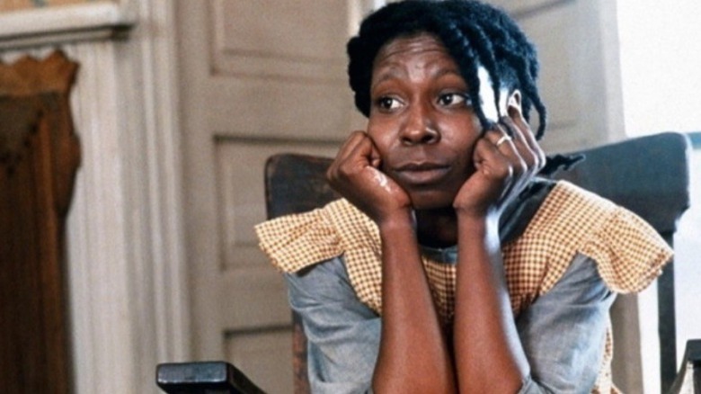 Whoopi Goldberg hands on face