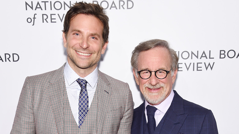 Bradley Cooper and Steven Spielberg posing together 