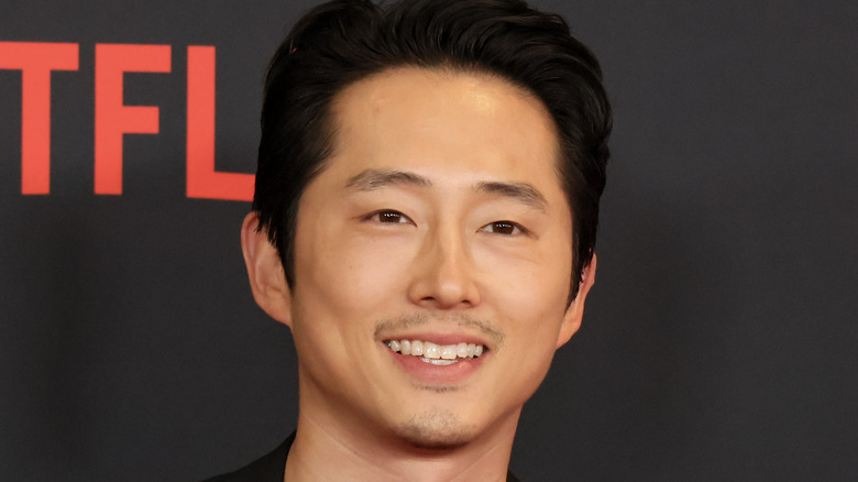 Steven Yeun smiling