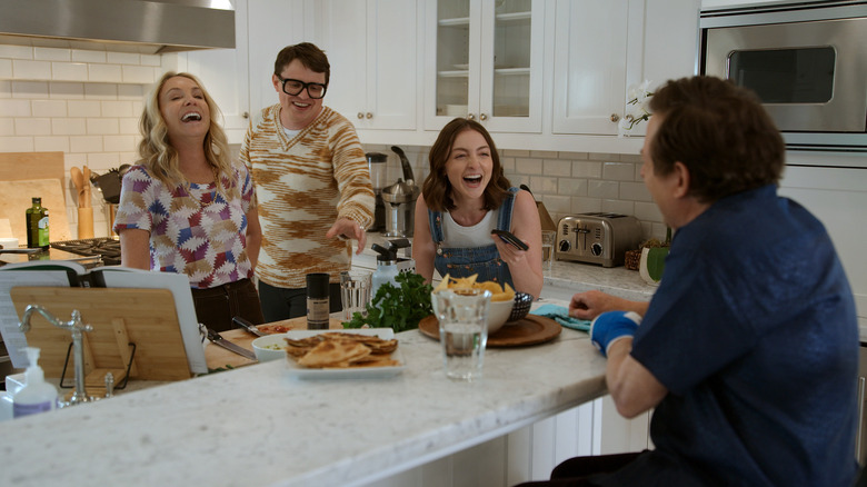 Michael J. Fox laughing with family