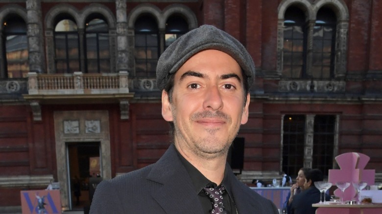 Dhani Harrison smiling outside