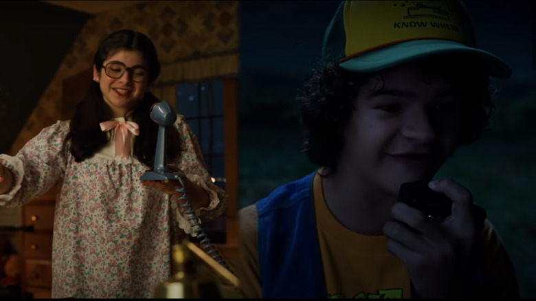 A girl and boy sing into walkie talkies in split screen