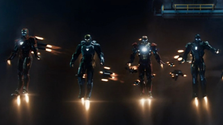 Several Iron Man suits flying