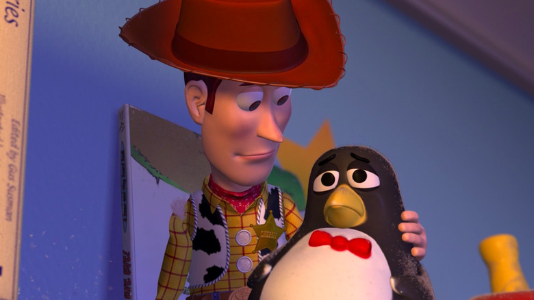 Woody holding Wheezy the penguin