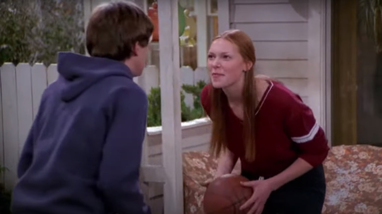 Donna holds the basketball