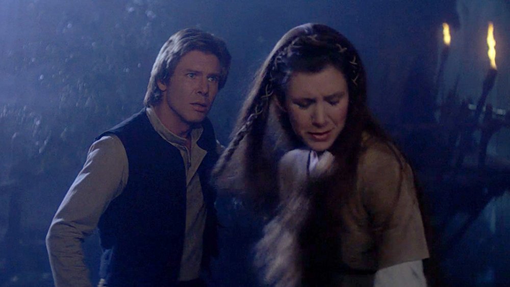 Carrie Fisher as Princess Leia and Harrison Ford as Han Solo talk in Star Wars: The Return of the Jedi