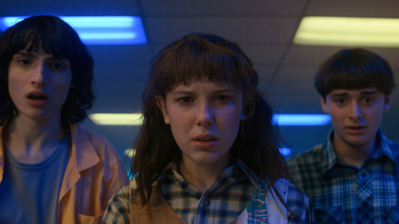 Mike and Eleven looking concerned