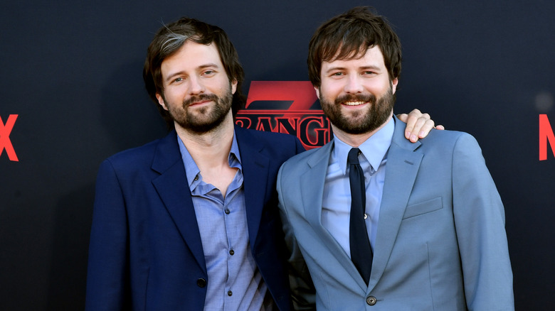 the Duffer brothers posing