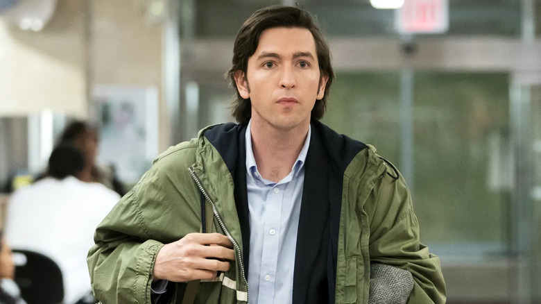 Nicholas Braun in rain jacket