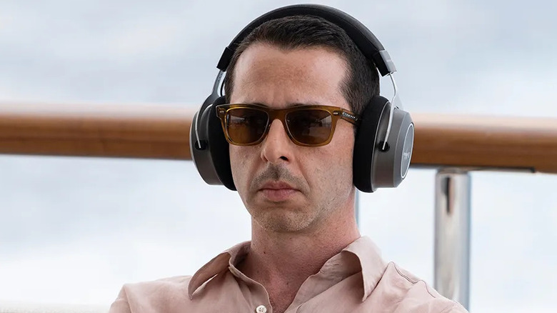 Jeremy Strong wearing headphones