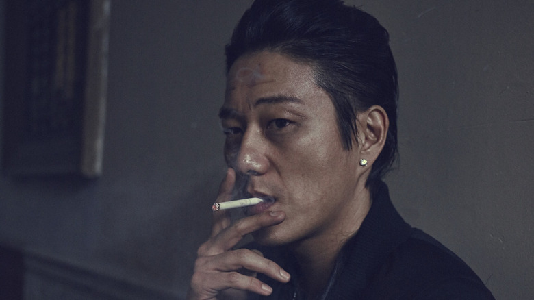 Sung Kang smokes