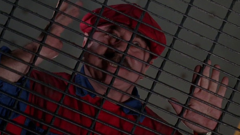 Mario behind a fence