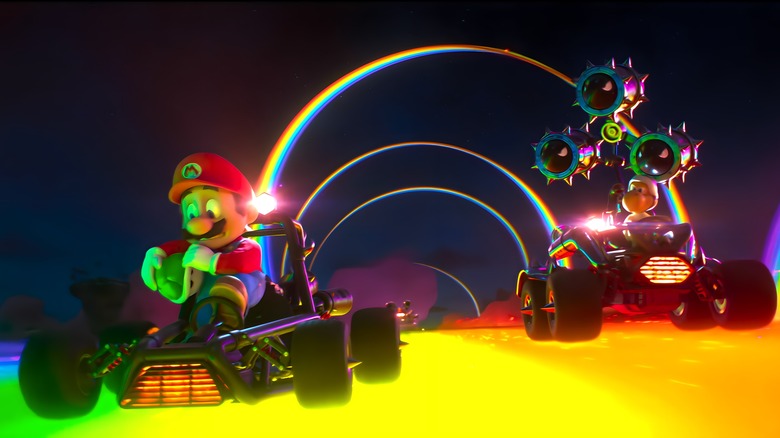 Mario is chased on Rainbow Road by a toad in a rocket kart