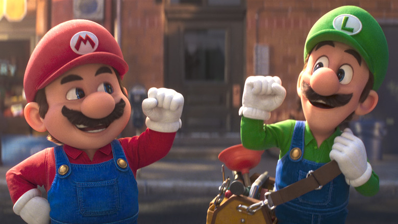 Mario and Luigi fist bumping