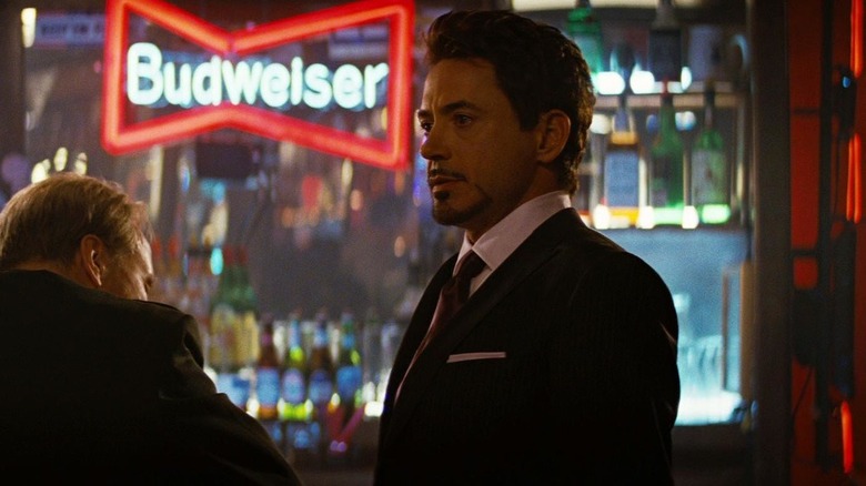 Tony Stark stood in a bar