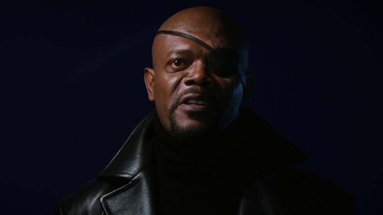 Nick Fury emerges from the shadows