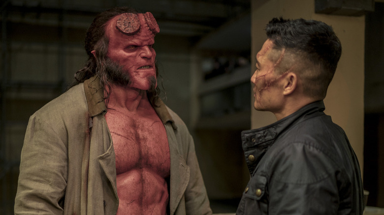 Hellboy in a brown coat in "Hellboy" (2019)