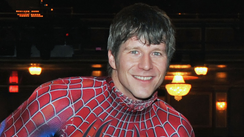 Christopher Tierney smiles as Spider-Man