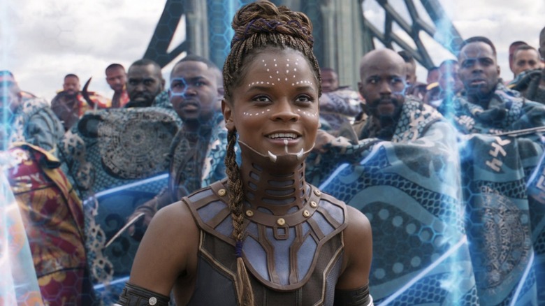 Shuri smiles amidst warriors