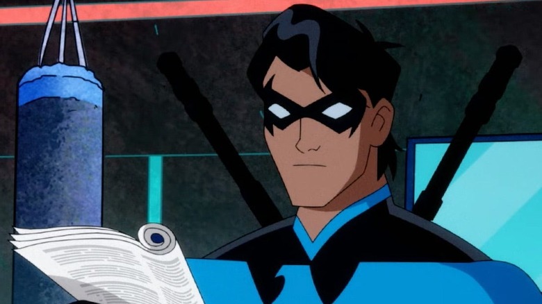 Nightwing reading the paper