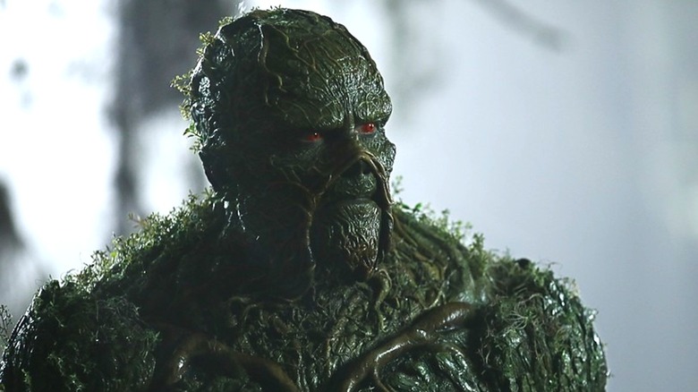 Swamp Thing standing in his swamp