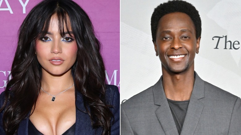 Isabela Merced and Edi Gathegi posing