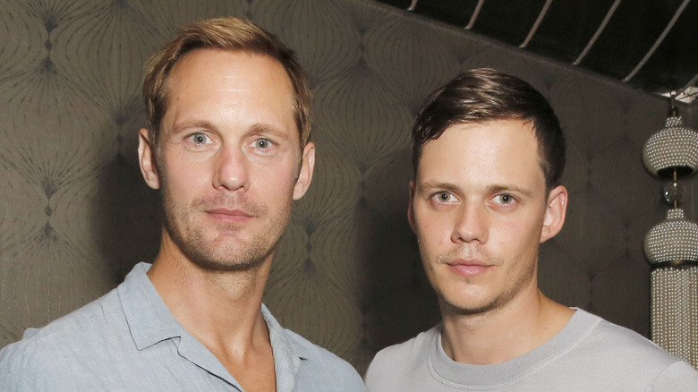 Bill and Alexander Skarsgard smirking