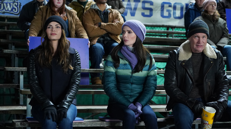 Lucy, Lois, and General Lane at football game