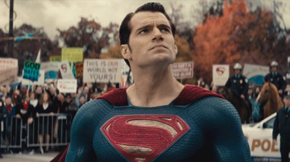 Superman in front of angry mob