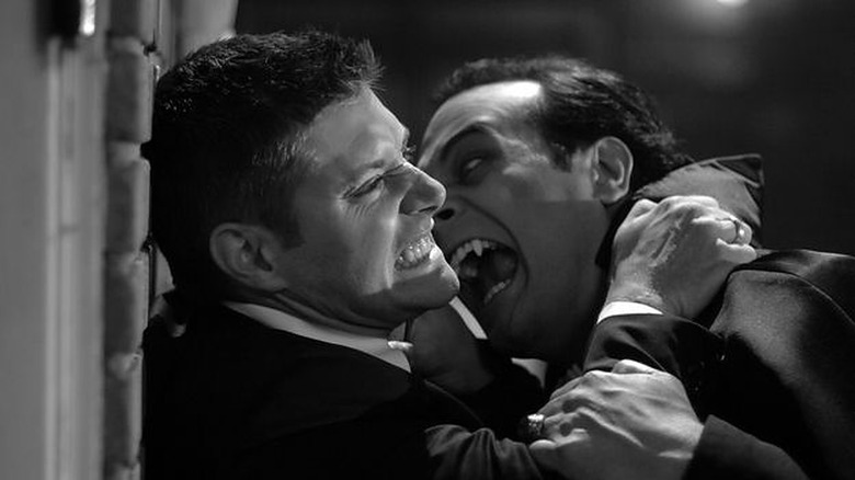 Dracula trying to bite Dean