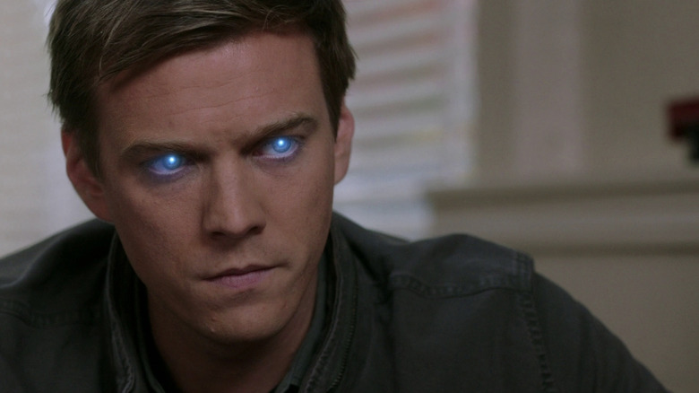 Michael with glowing blue eyes