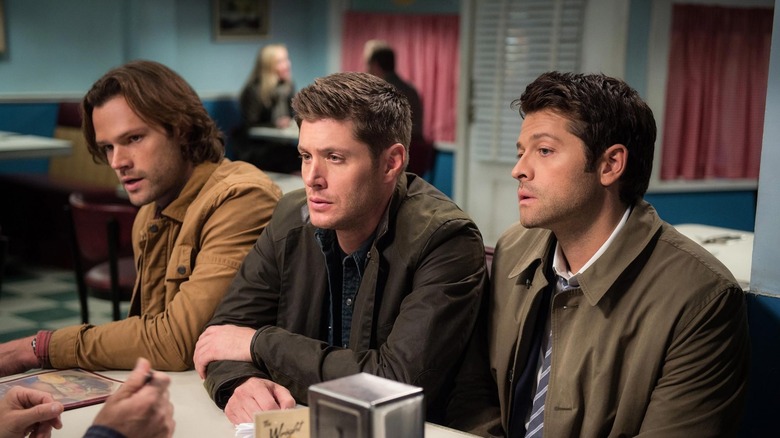 Sam, Dean, and Castiel sitting