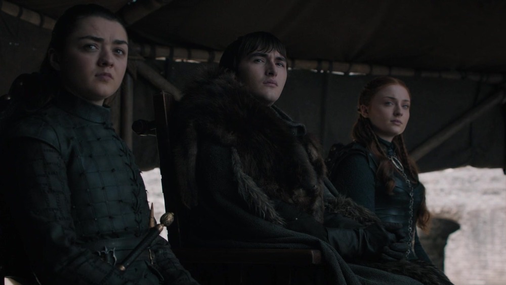 Arya Stark, Bran Stark and Sansa Stark listening